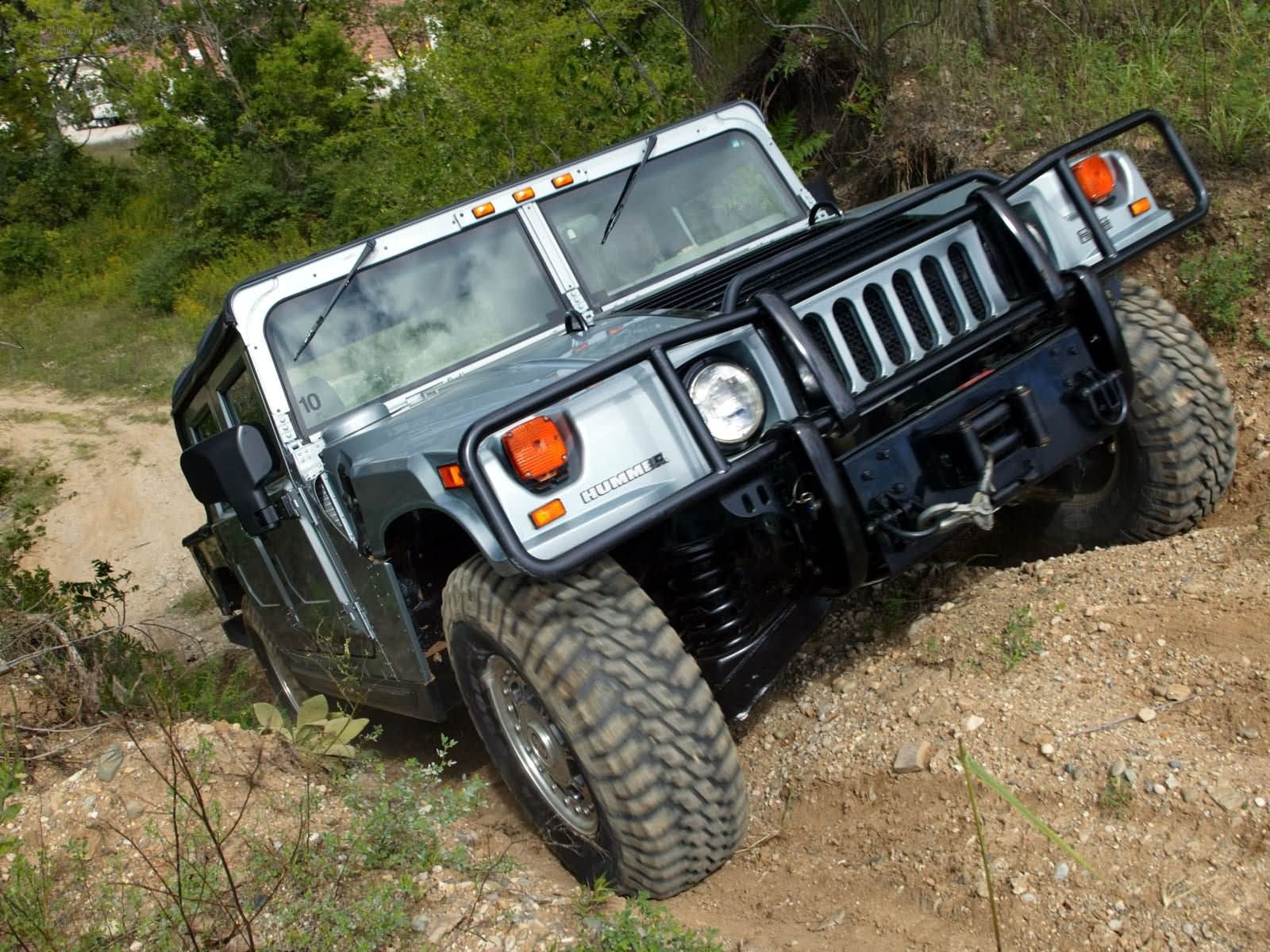 Humvee off-roading on dirt path