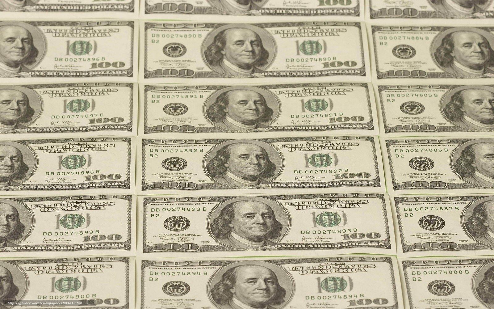 hundred-dollar bills arranged in rows