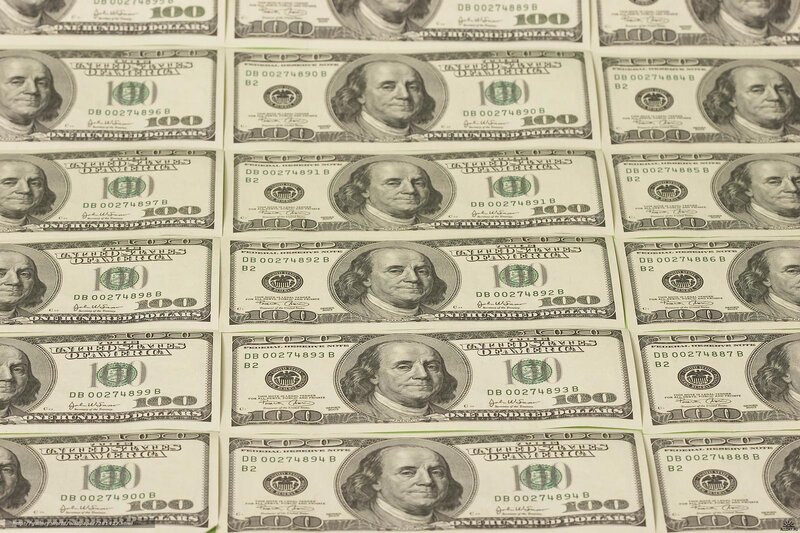 hundred-dollar bills arranged