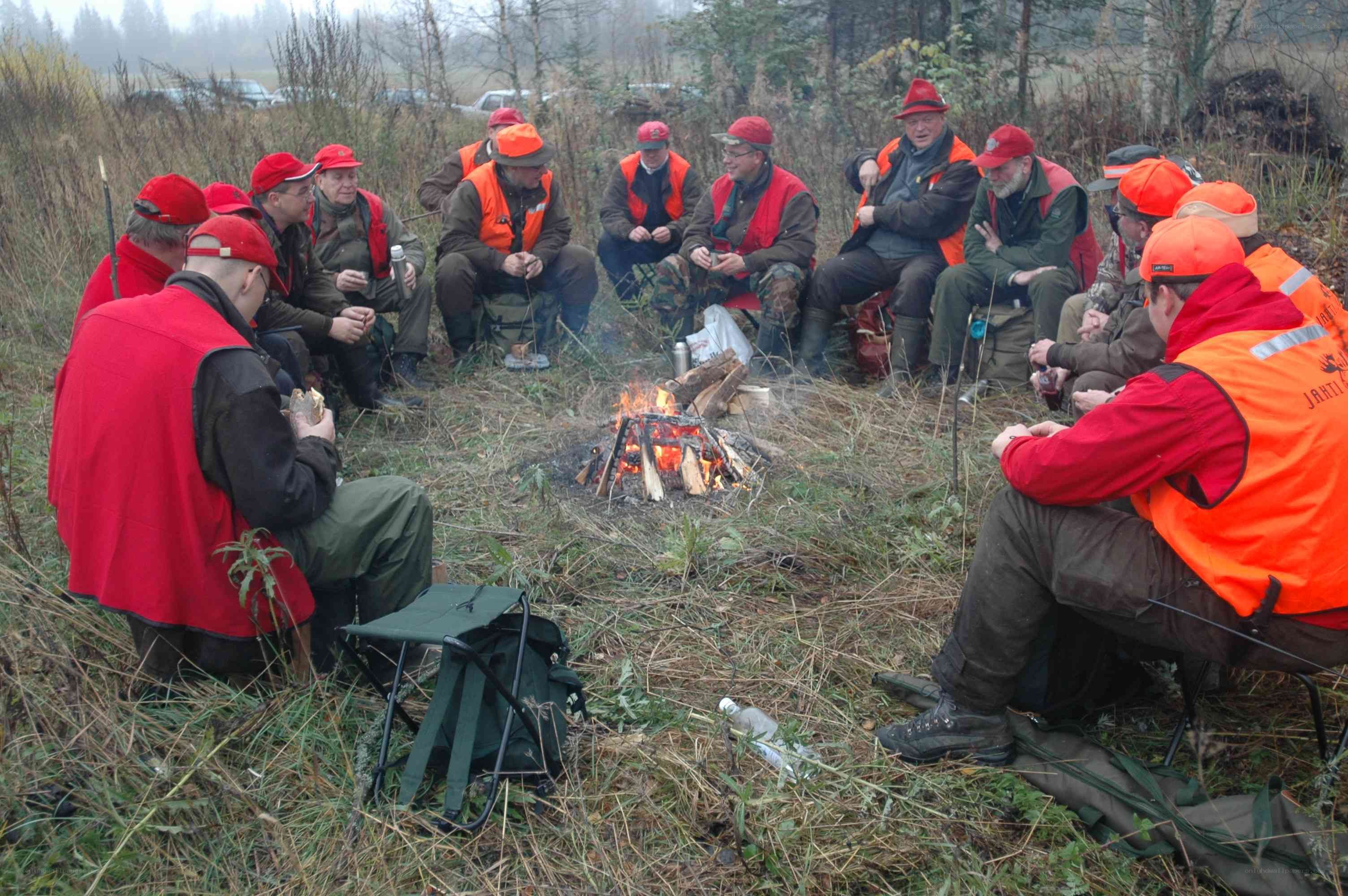 Hunters around a campfire