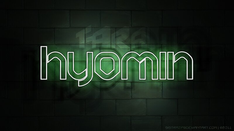 Hyomin neon sign on brick wall