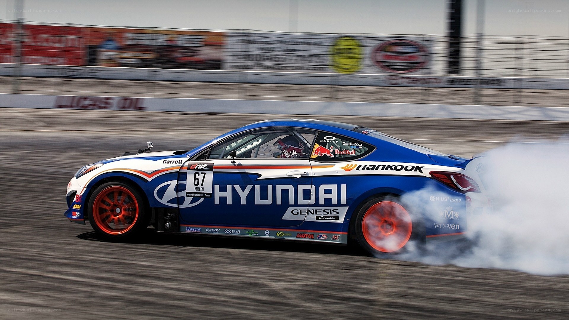 Hyundai Genesis drifting on track