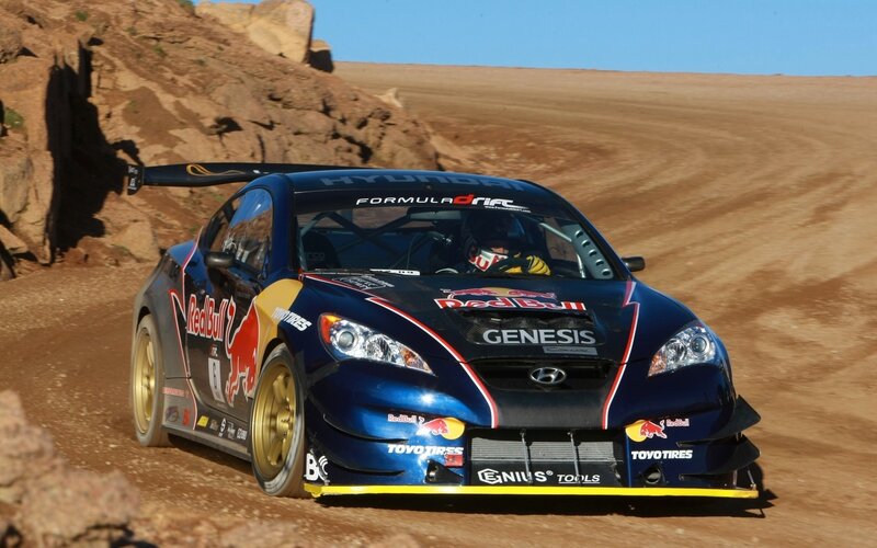 Hyundai racing car on dirt track