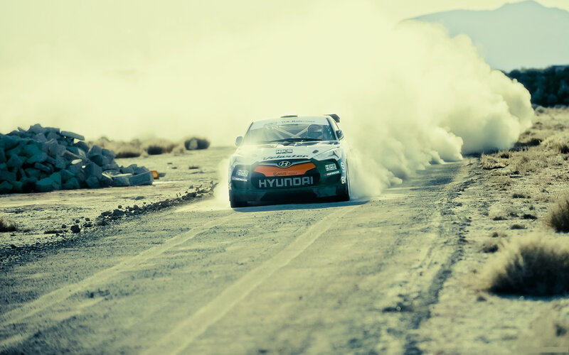 Hyundai rally car on dusty track
