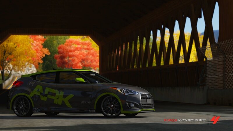 Hyundai Veloster in autumn scenery