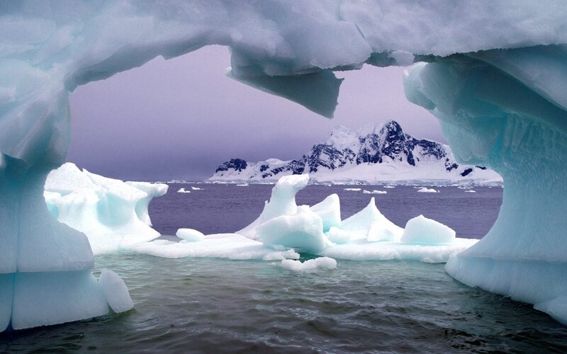 Ice Arch Framing Icebergs — Blue