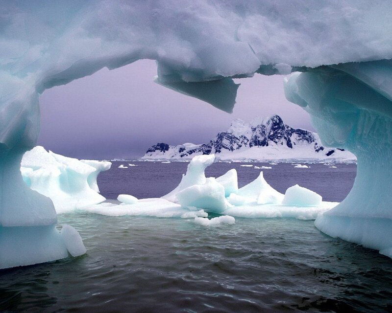 Ice Arch Framing Mountains — Blue, Serene, Winter