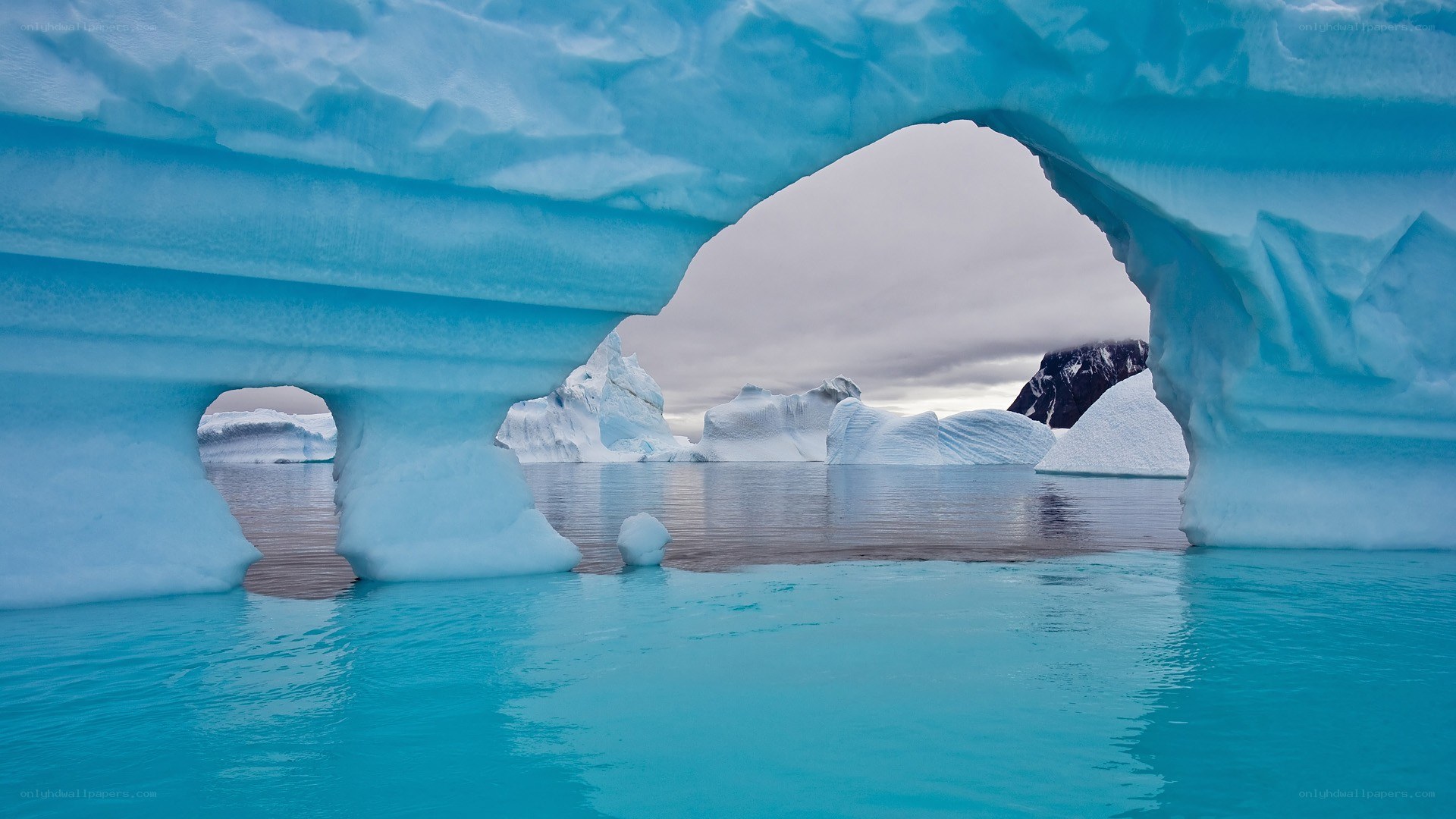 ice arch in antarctic waters