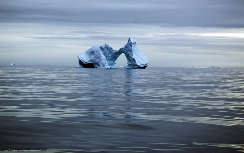 Ice arch in calm sea