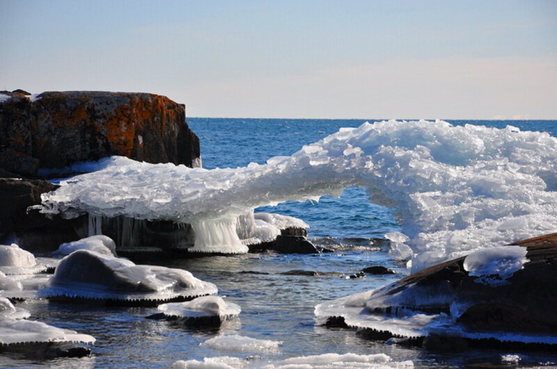 Ice Arch on Rocky Shore
