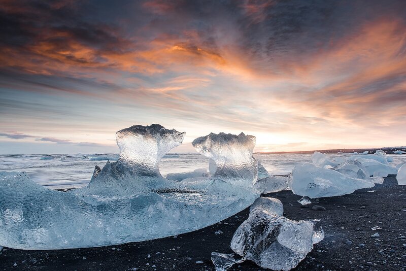 Ice Blocks on Black Sand