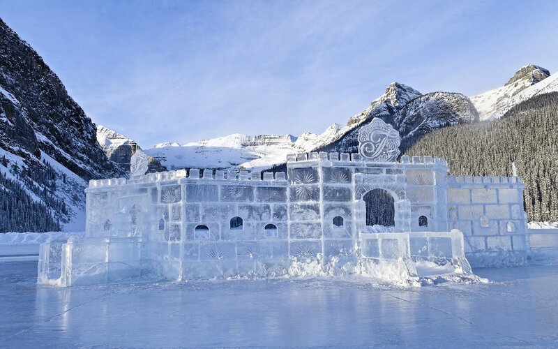 Ice castle on frozen lake