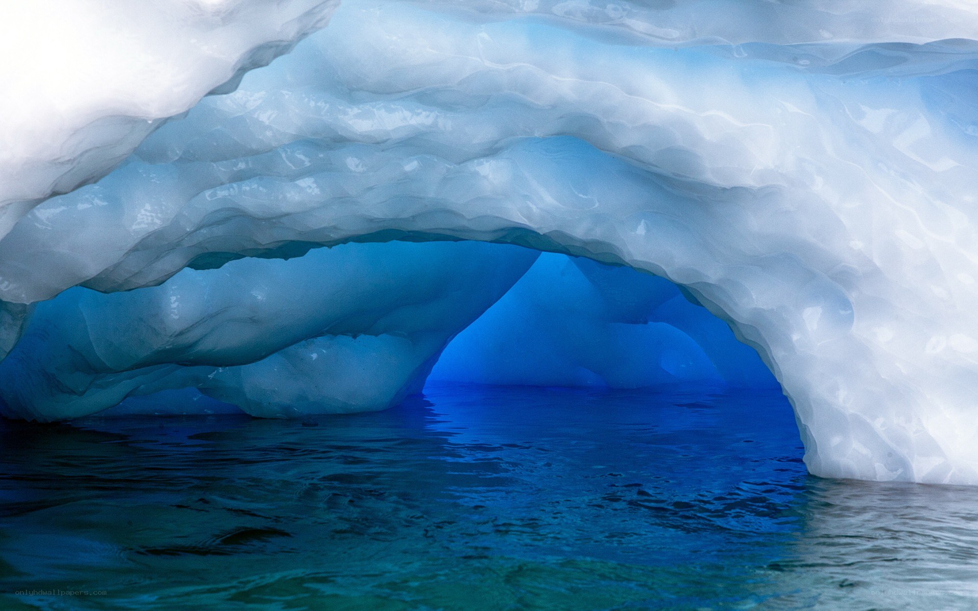 Ice cave with blue water