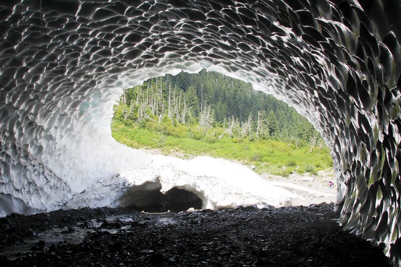 Ice cave with forest view