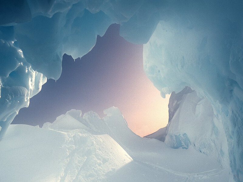 Ice cave with sunset view