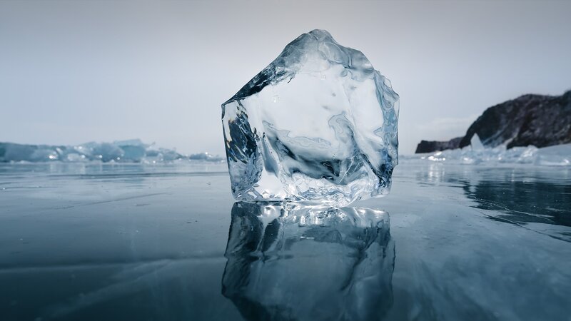 Ice Chunk on Frozen Lake — Blue