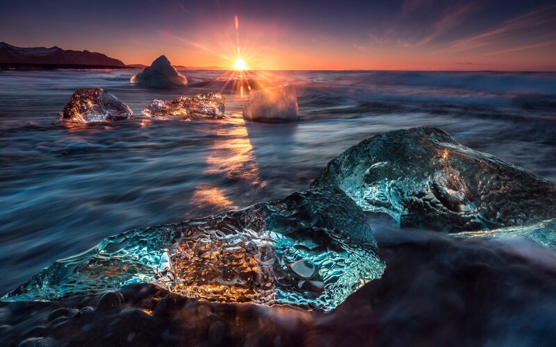 Ice Chunks on Beach — Blue, Dramatic, Sunrise