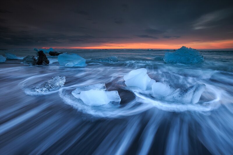 Ice Chunks on Beach — Blue, Dramatic, Sunset, Photograph, Ocean, Sky, Waves