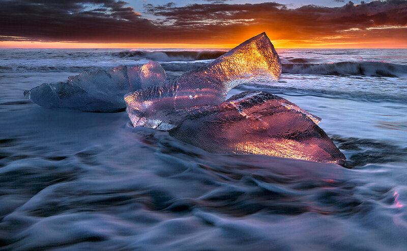 Ice Chunks on Beach — Orange, Dramatic