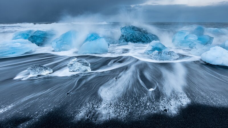 Ice Chunks on Black Sand — Blue, Dramatic, Photograph