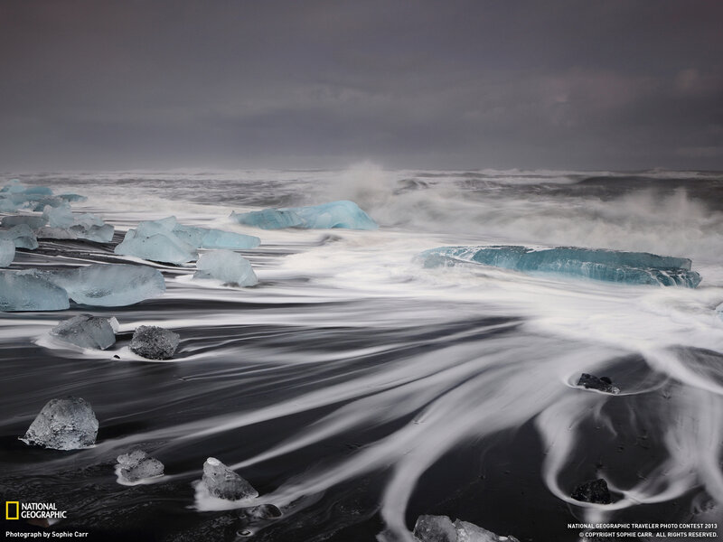 Ice Chunks on Black Sand — Blue