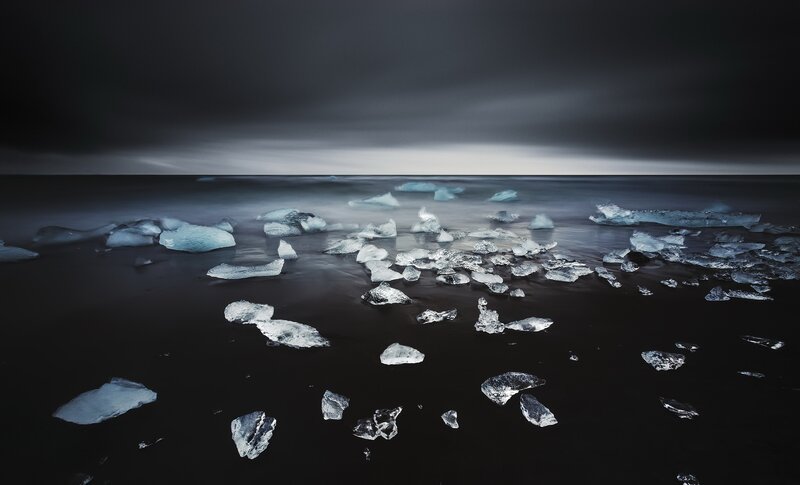 Ice Chunks on Black Sand — Dramatic, Night