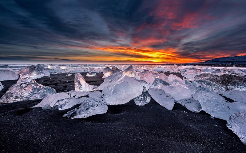 Ice Chunks on Black Sand — Dramatic, Sunset, Photograph, Black Sand Beach