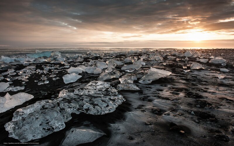 Ice Chunks on Black Sand — Dramatic