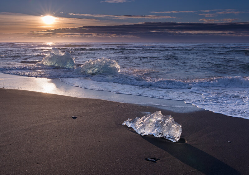 Ice Chunks on Black Sand — Serene