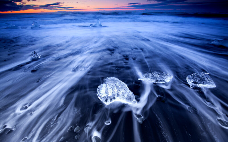 Ice Chunks on Black Sand