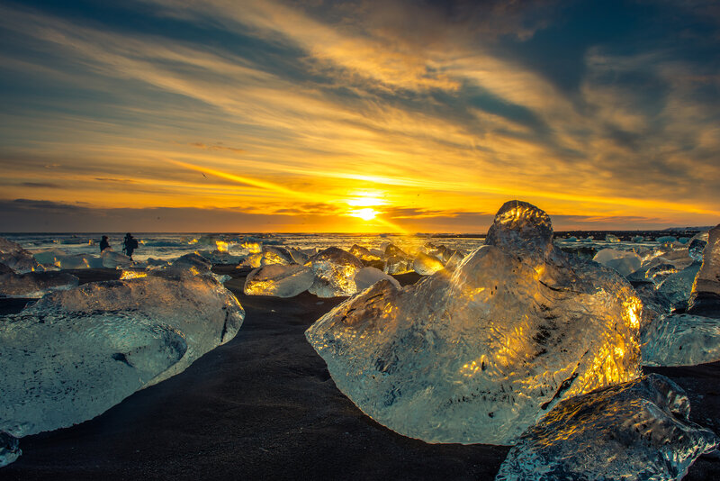 Ice Chunks on Black Sand — Yellow