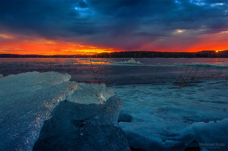 Ice Chunks on Frozen Lake — Blue, Dramatic, Sunset