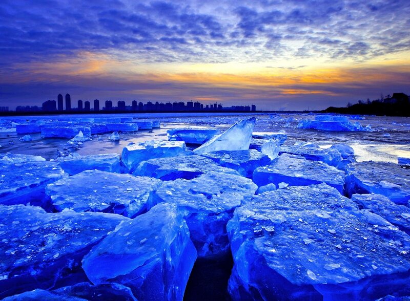Ice Chunks on Frozen River — Blue