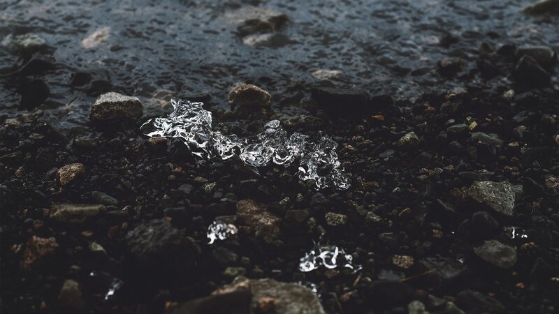 Ice Chunks on Pebbles