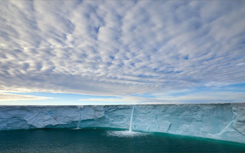 Ice Cliff with Waterfalls — Blue