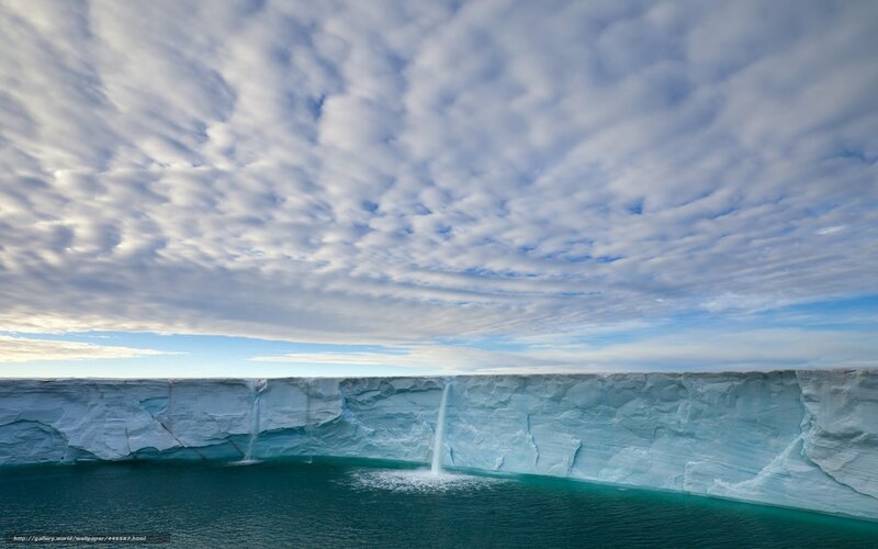 Ice cliff with waterfalls