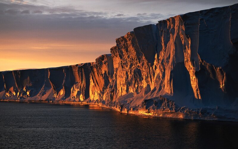 Ice Cliffs at Sunset — Orange