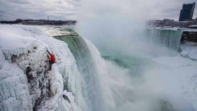 Ice Climber at Waterfall