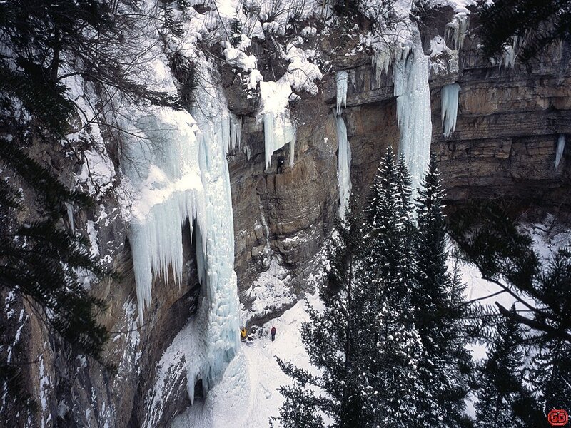 Ice climbers on a frozen waterfall