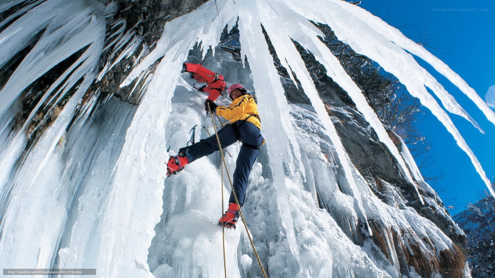 Ice climbing on a frozen waterfall