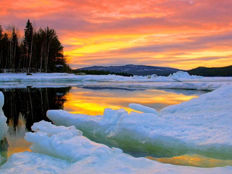 Ice-covered River at Sunset