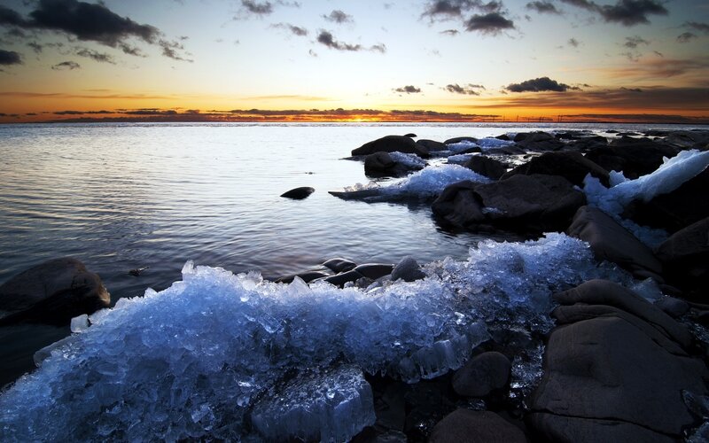 Ice-covered Rocks at Sunset — Blue