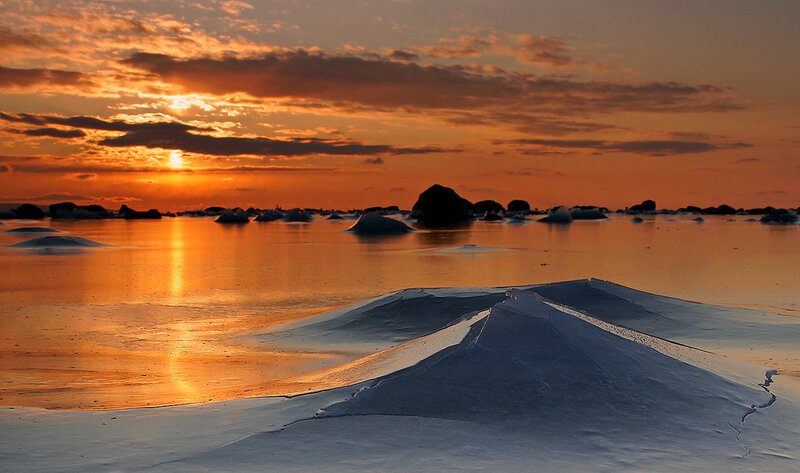Ice-covered Water at Sunset — Orange