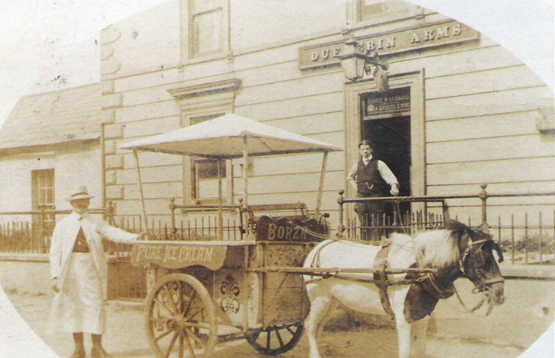 Ice cream cart in front of pub
