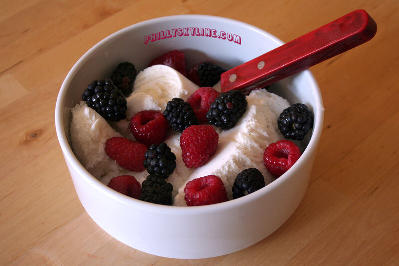 ice cream with berries in bowl