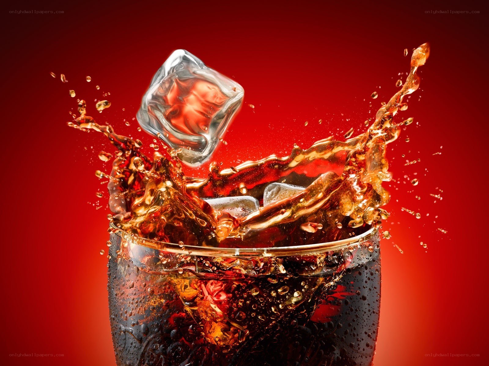 ice cube splashing in soda