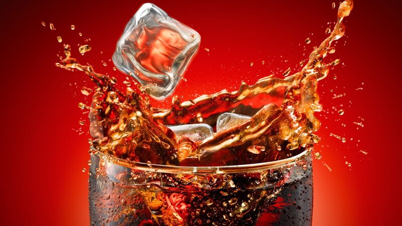 Ice Cube Splashing in Soda — Red