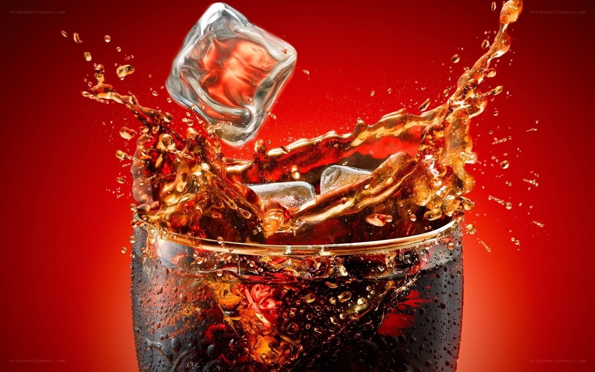 ice cube splashing in soda