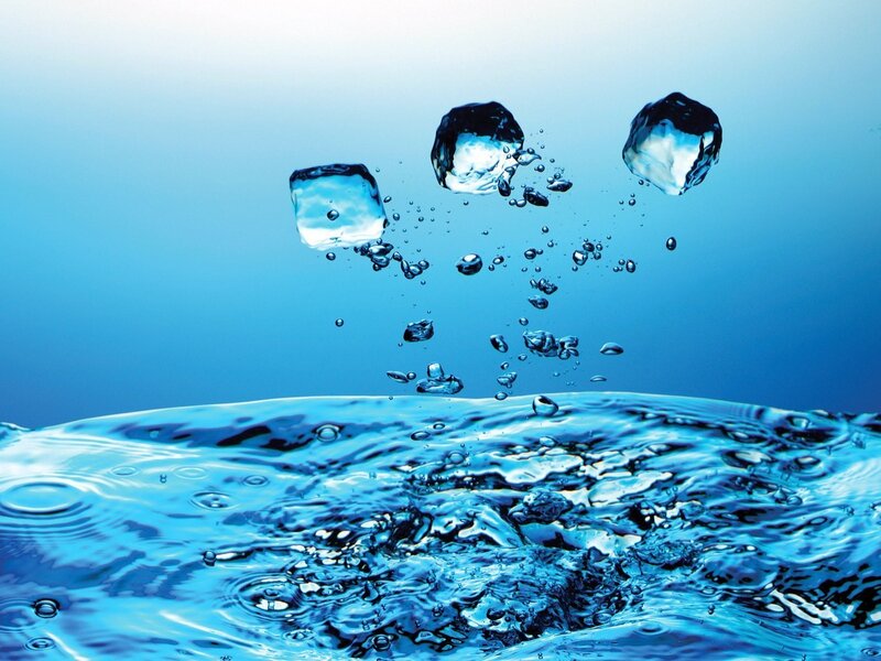 ice cubes falling into water