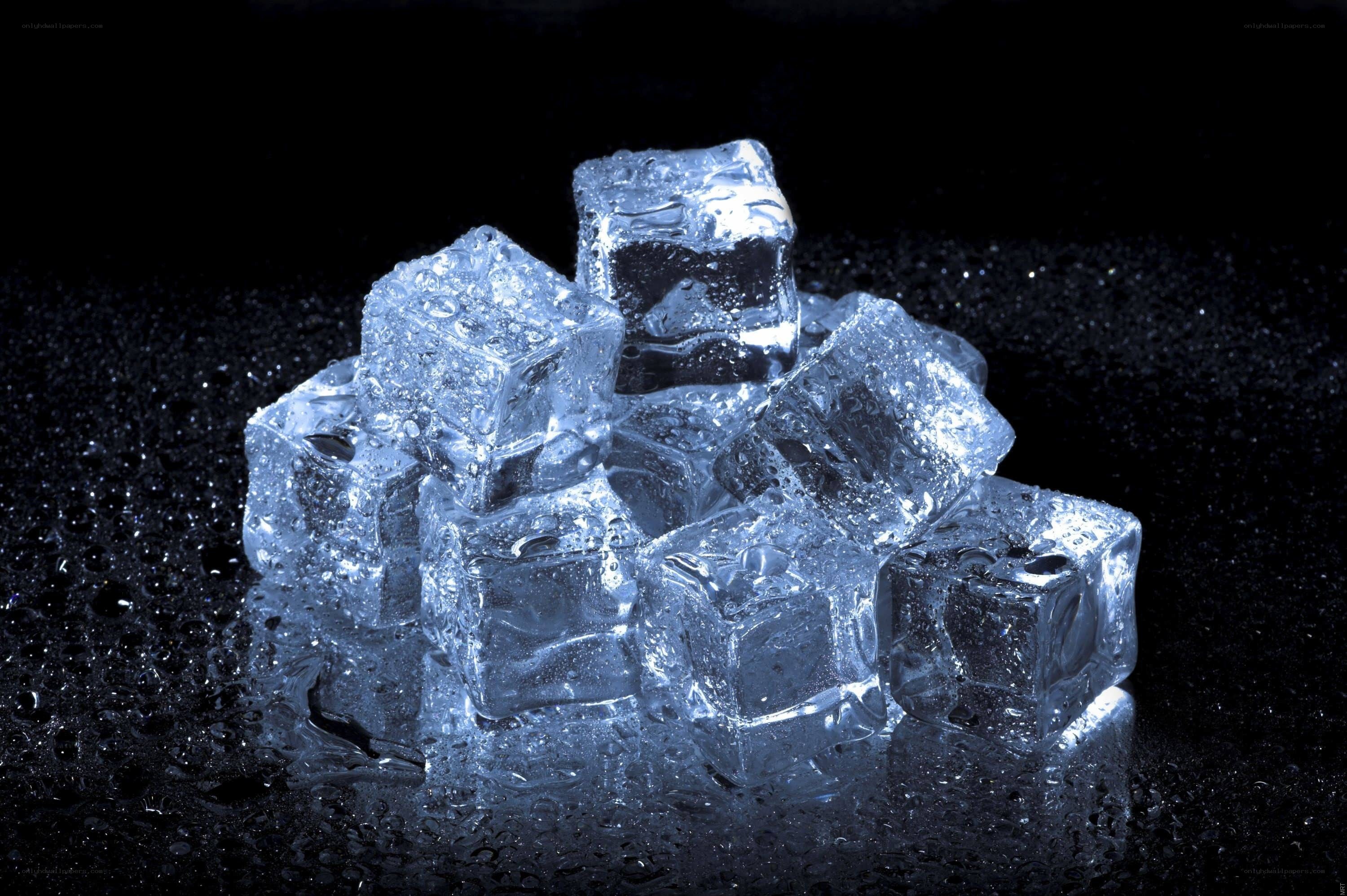 ice cubes on black surface